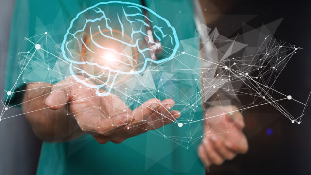 Illustrated brain in hand